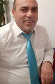 ÖZKAN GÜLİ  
